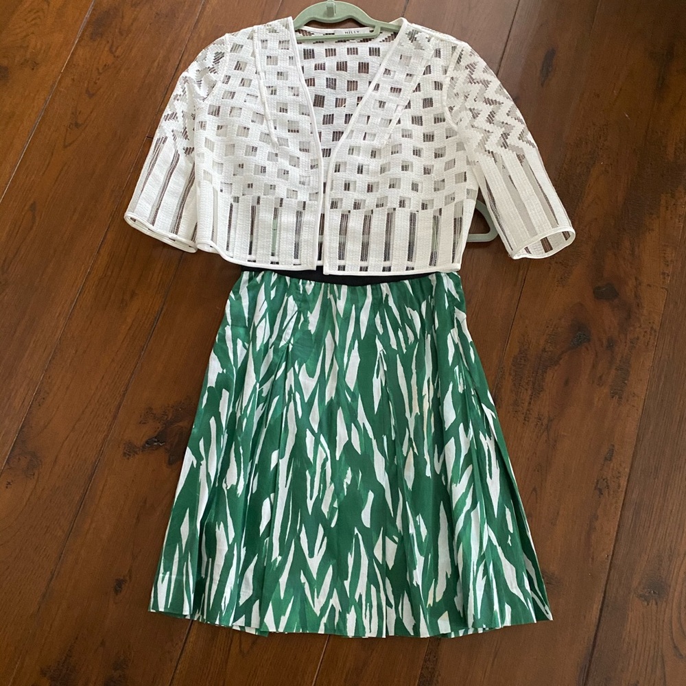 Mildly White lattice bolero jacket.